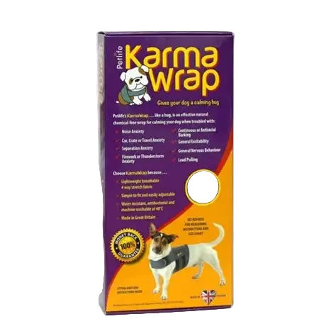 Karma Wrap pet relief box for dogs, featuring a purple and orange design with a cartoon dog and a real dog photo on the front packaging.