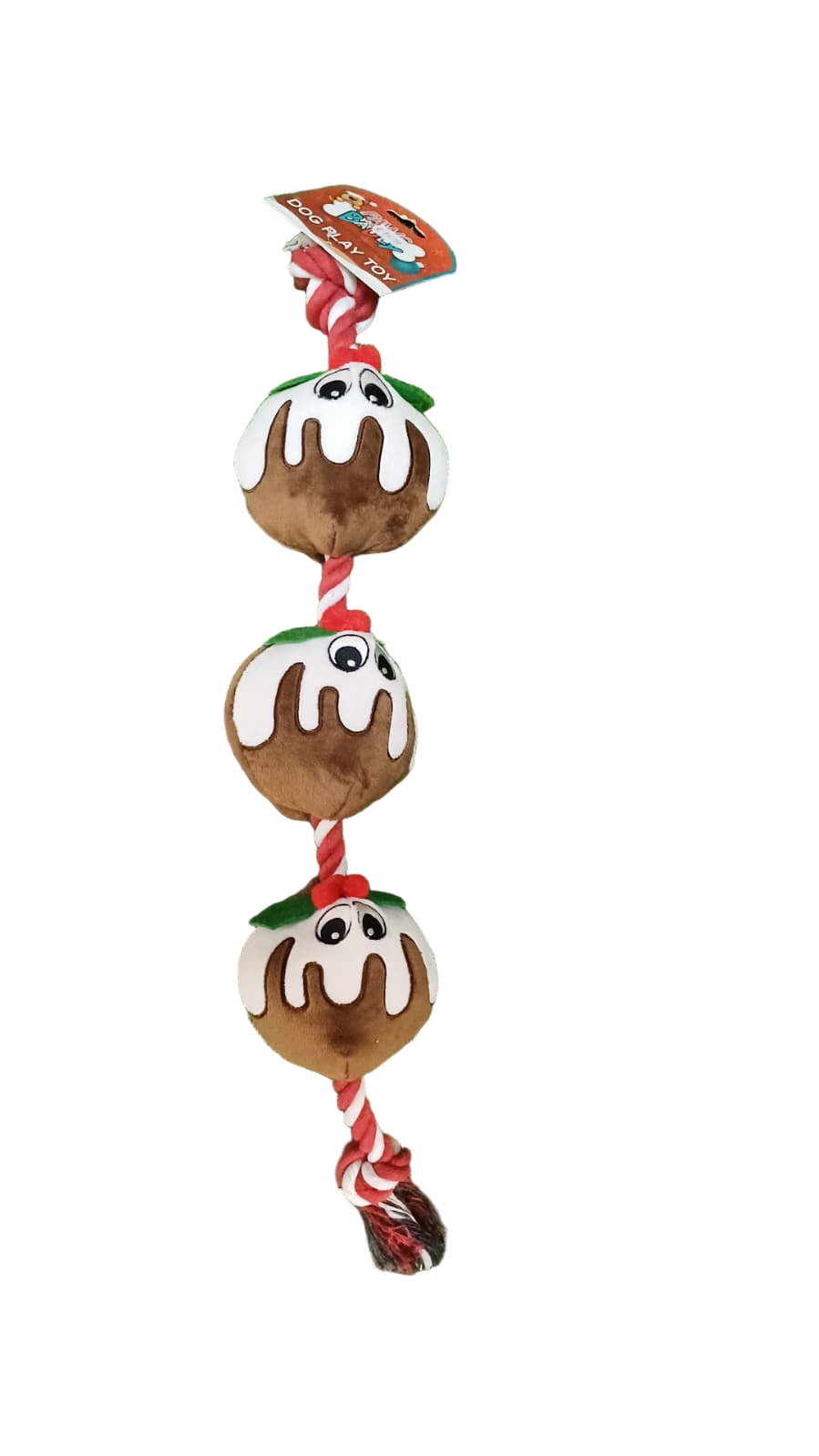 Dog toy with three brown and white dessert-shaped plushies on a red and white rope against a green grass background.