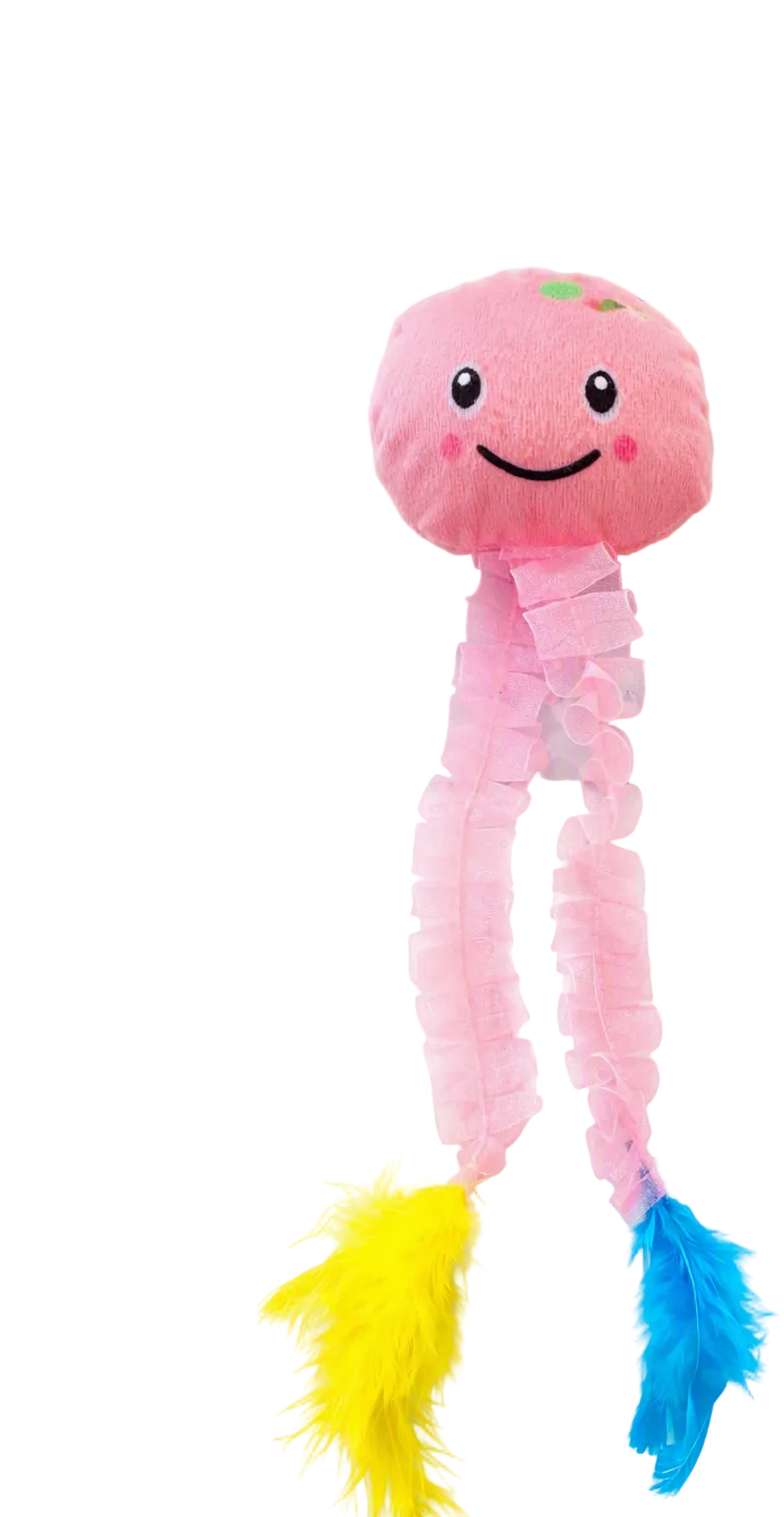 Pet Touch Kitty Play Undersea Pals cat toy in its original blister packaging, featuring a pink plush sea-creature head with a smiling face and two long, frilly pink tentacles ending in yellow and blue feathers.